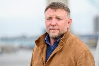 black bear sets release date for guy ritchies in the grey after delay 6979478d8dd50