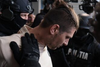 costinel zuleam capul gruparii care l a ucis pe milionarul adrian kreiner a fost adus in tara risca ani grei de inchisoare foto video 6970e5180bd4d